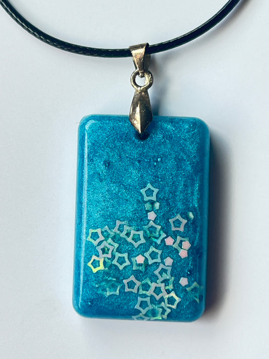 Constellation Drift — Teal & Iridescent Star Resin Pendant