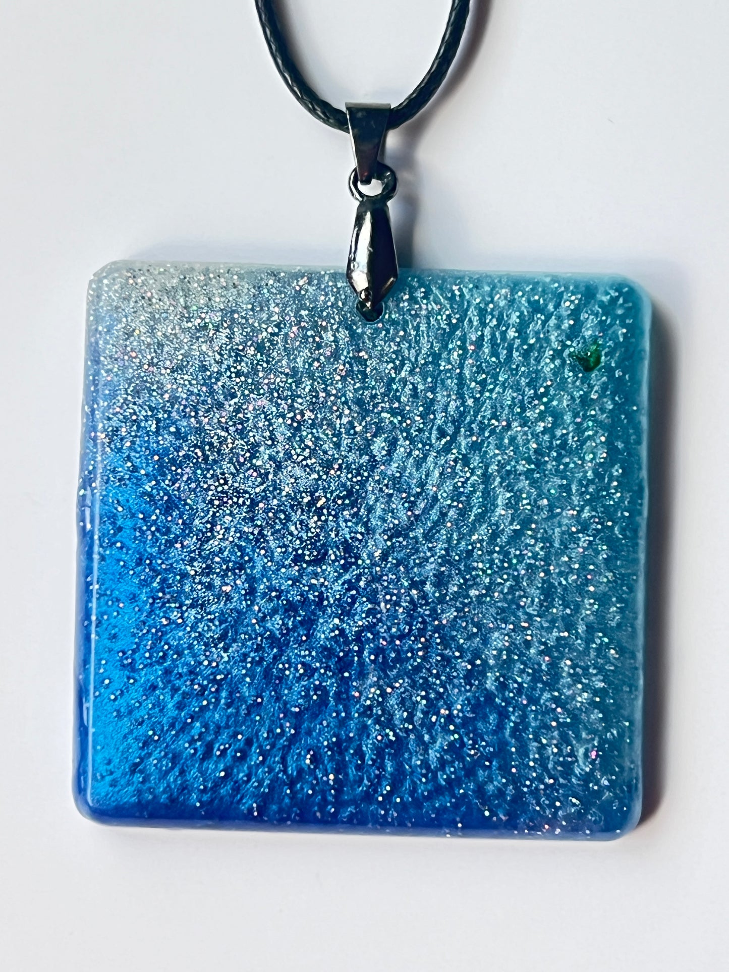 Deep Water Shimmer — Blue & Silver Glitter Resin Pendant