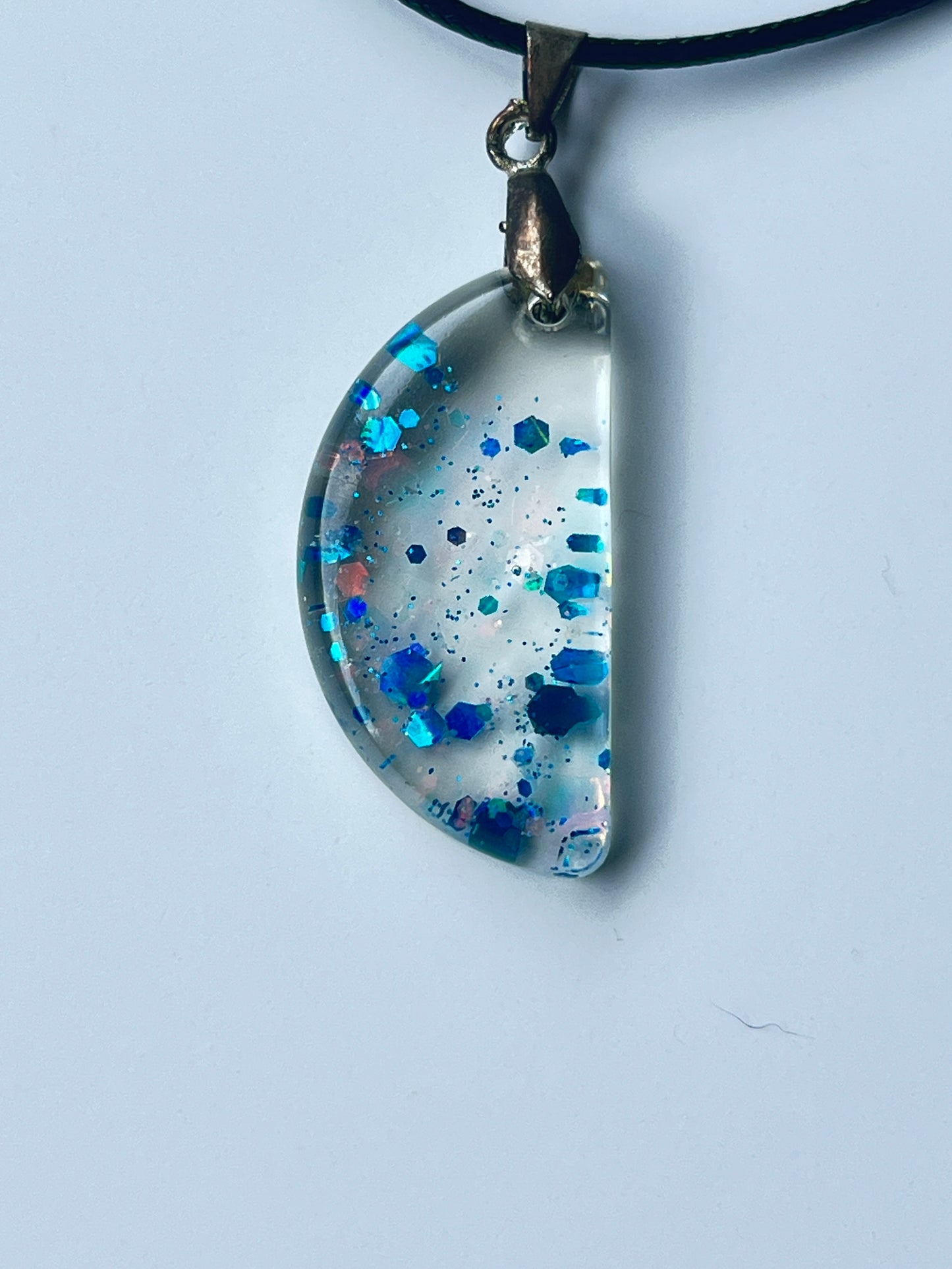 Blue Crystal Moon — Clear & Sapphire Glitter Half Moon Resin Pendant