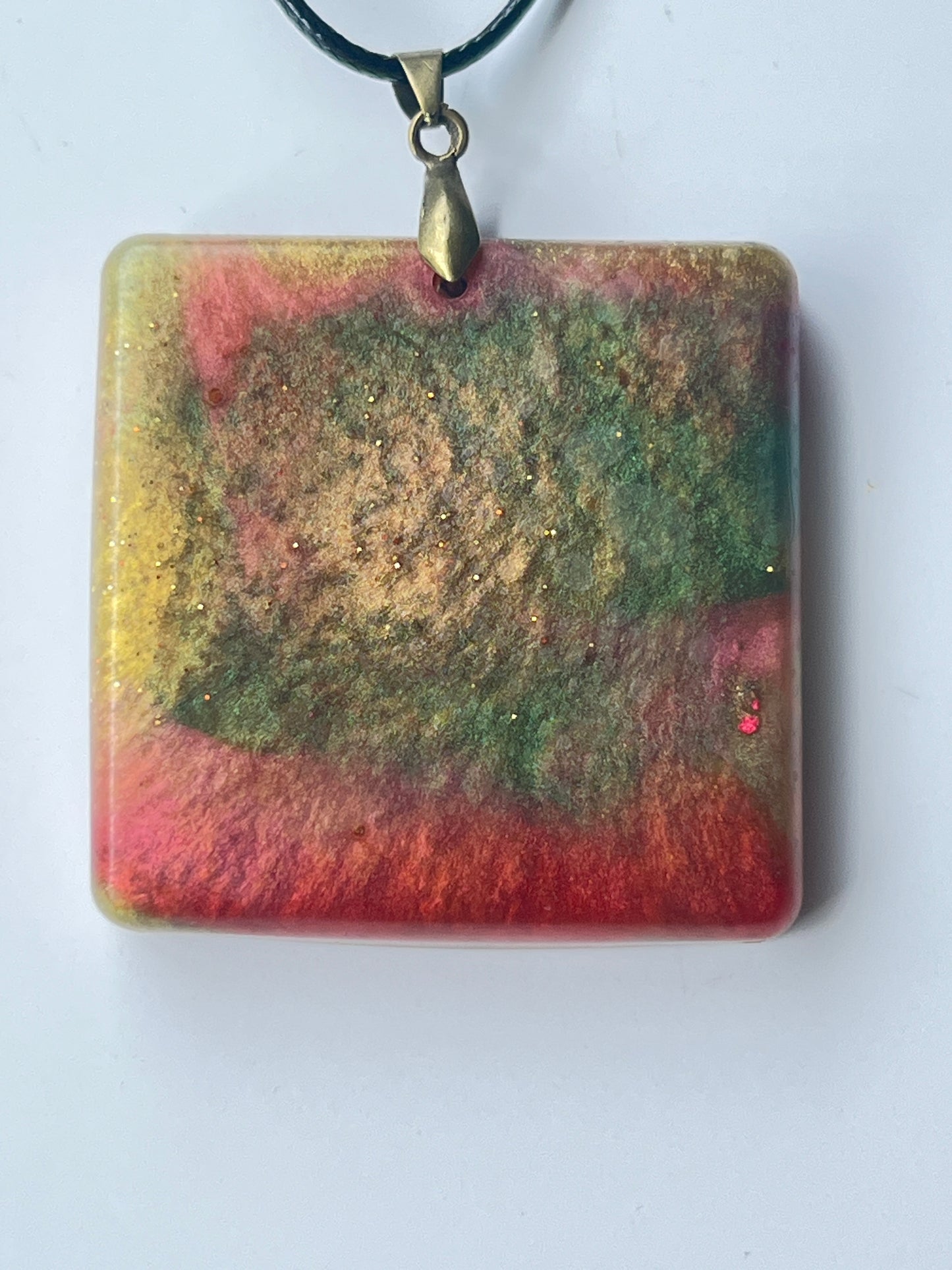 Terra Spiralis — Olive, Red & Gold Resin Pendant