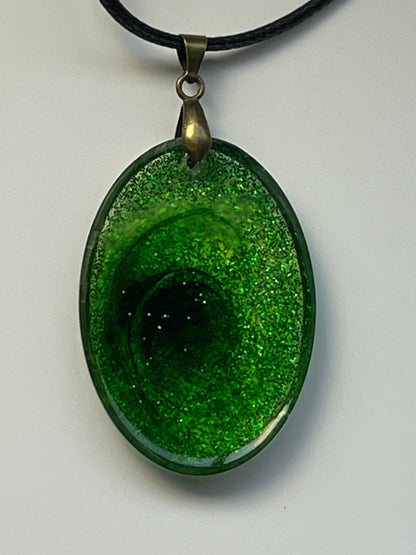 Emerald Vortex — Green Glitter Oval Resin Pendant