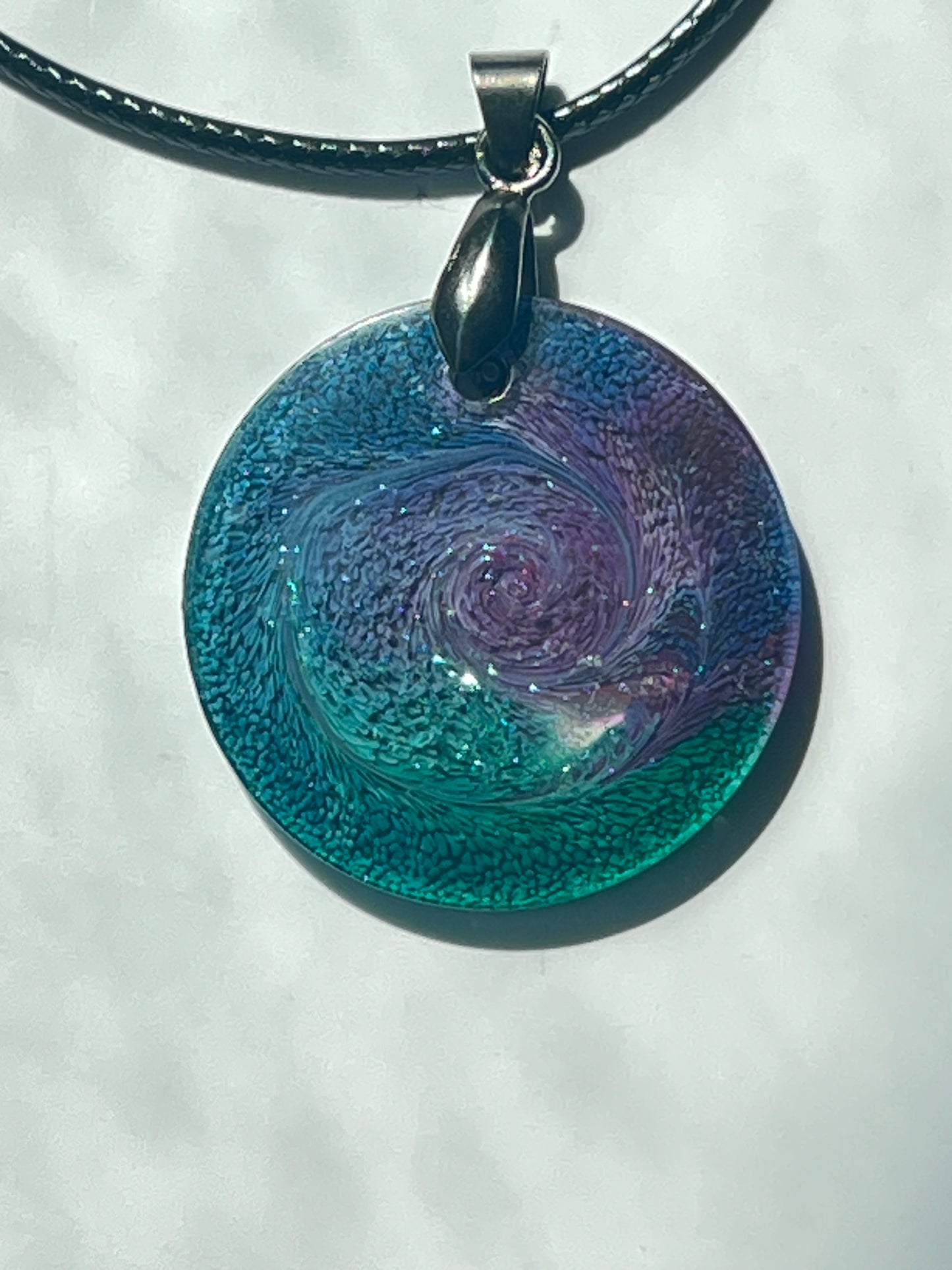 Starry Vortex — Teal & Violet Galaxy Resin Pendant