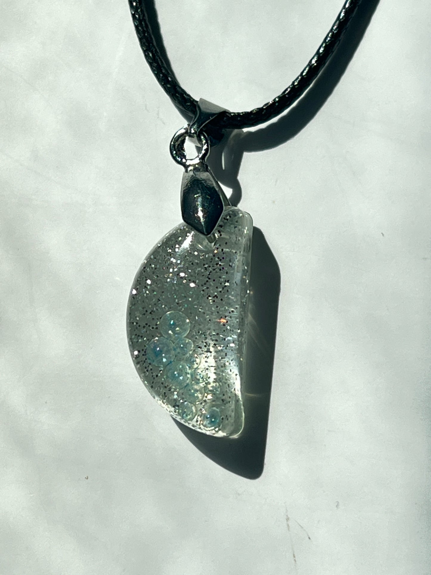 Frozen Light — Silver & Clear Half Moon Resin Pendant