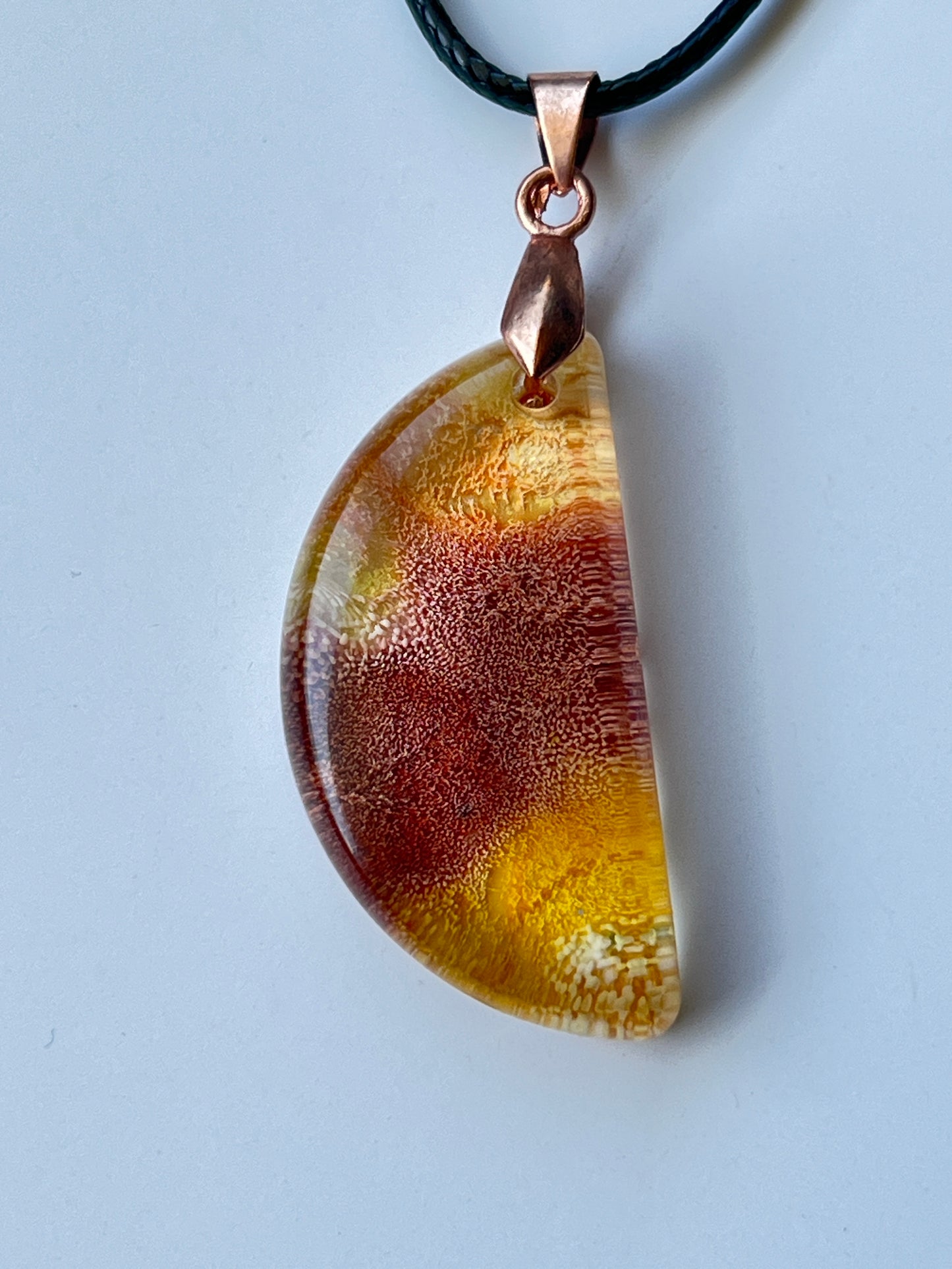 Amber Eclipse — Gold & Copper Half Moon Resin Pendant