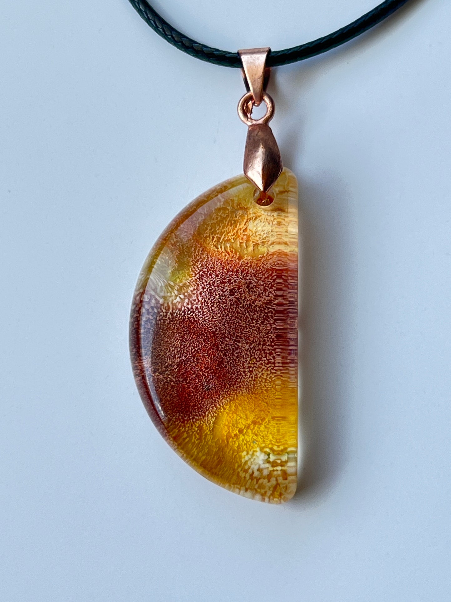 Amber Eclipse — Gold & Copper Half Moon Resin Pendant