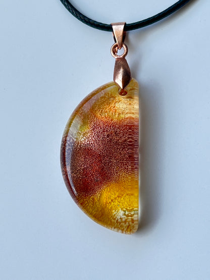 Amber Eclipse — Gold & Copper Half Moon Resin Pendant