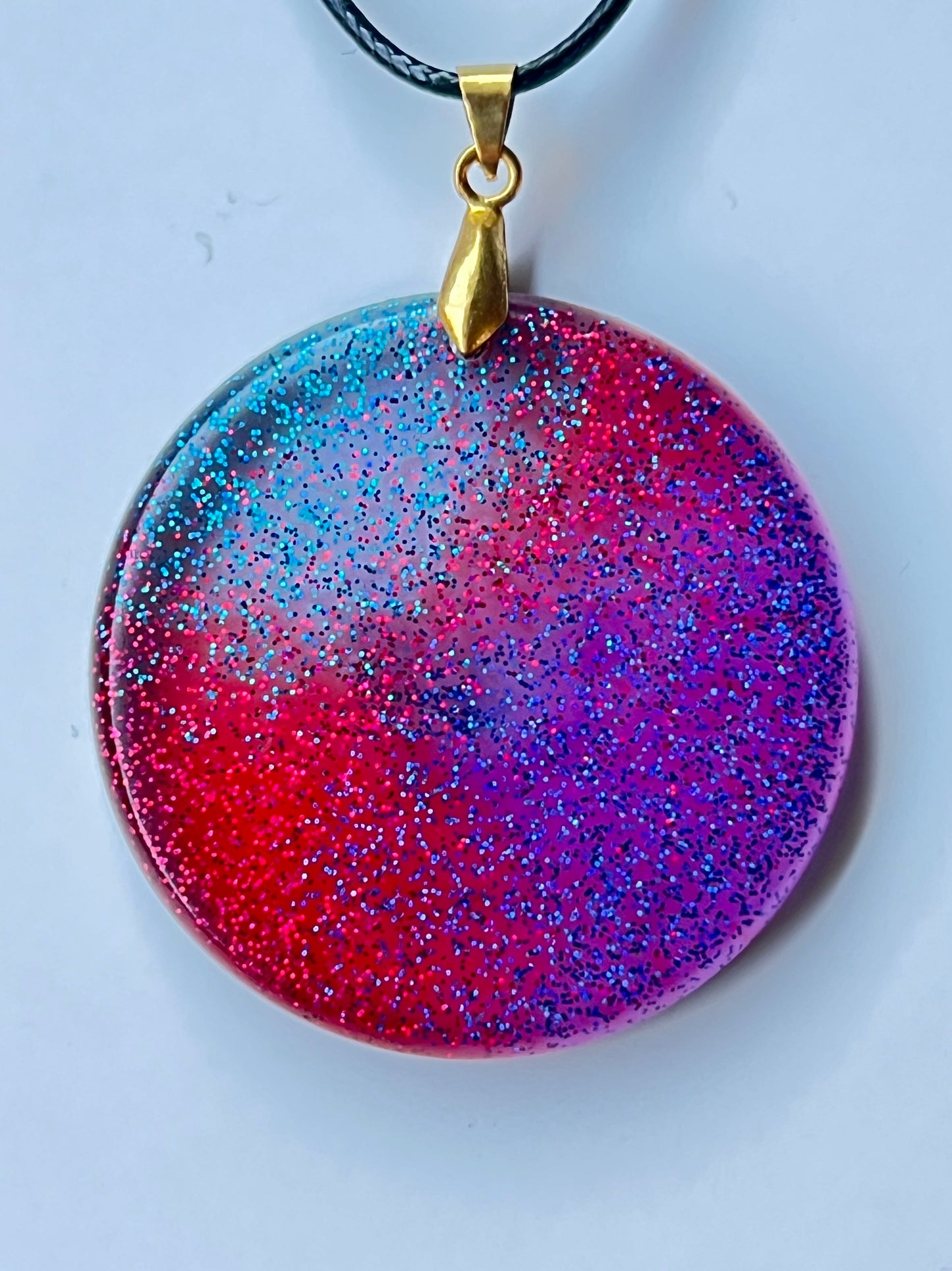 Galaxy Wheel — Red, Violet & Blue Galaxy Resin Pendant