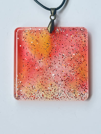 Peach Nebula — Coral, Peach & Glitter Resin Pendant