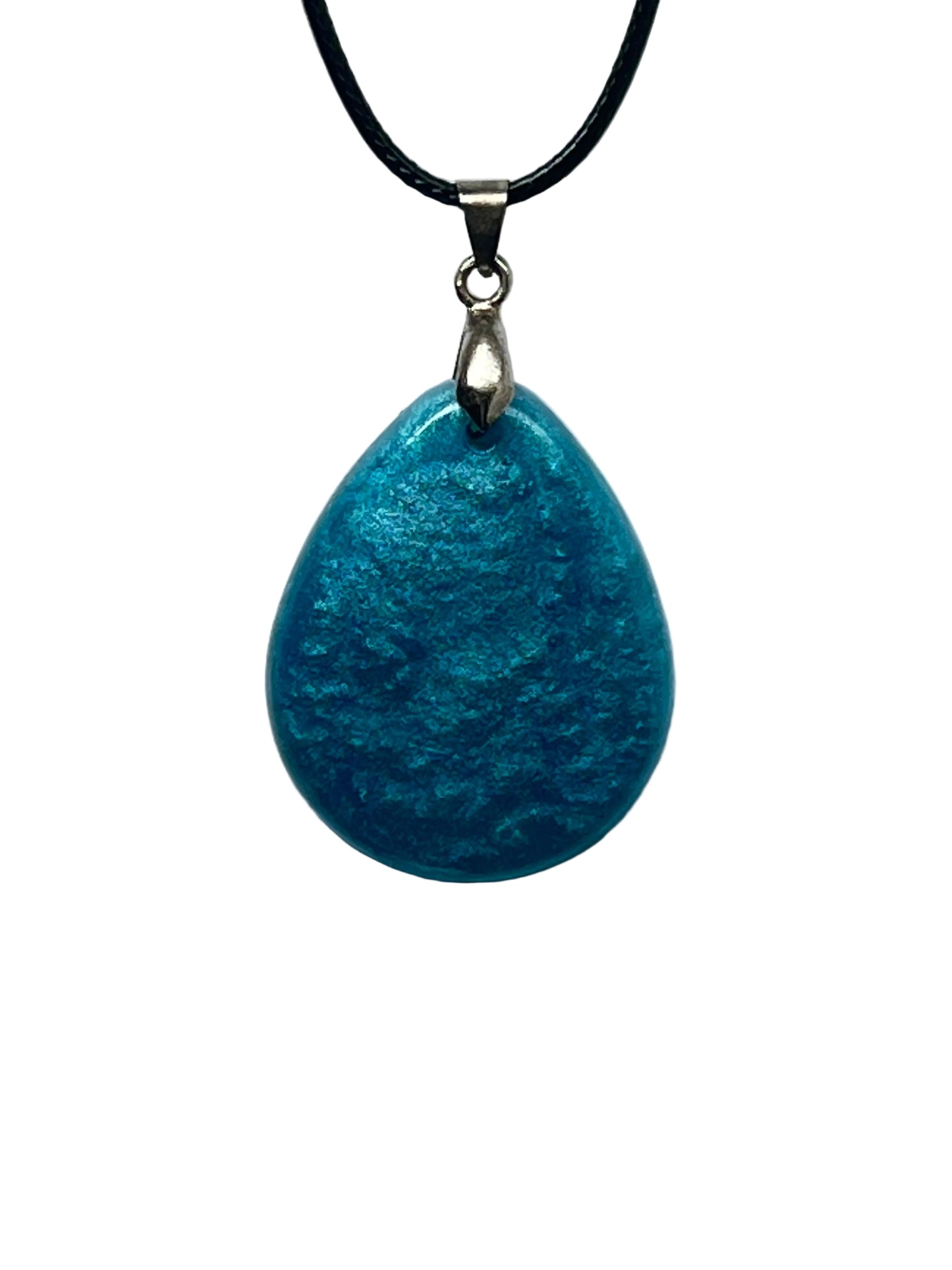 A smooth teardrop-shaped resin pendant in shimmering teal and aqua blue with a frosted, mottled, water-like texture and pearlescent currents. It hangs from a silver-toned bail on a black braided cord against a pale background.