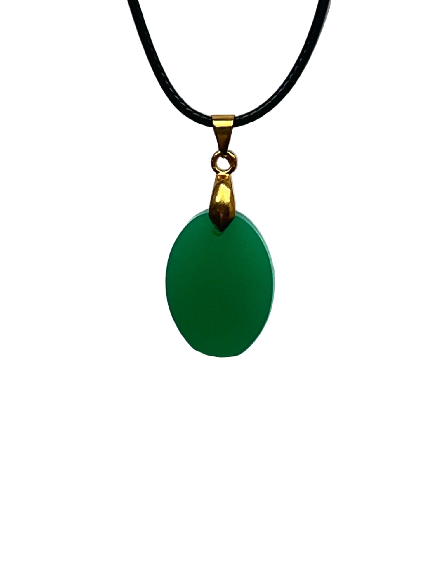 A smooth oval-shaped resin pendant in a solid, rich jade green with a soft luminous finish and no inclusions. It hangs from a gold-toned bail on a black braided cord against a pale background.