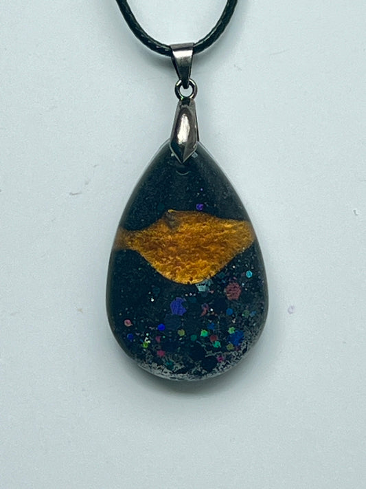 Comet Trail — Black & Gold Galaxy Resin Pendant