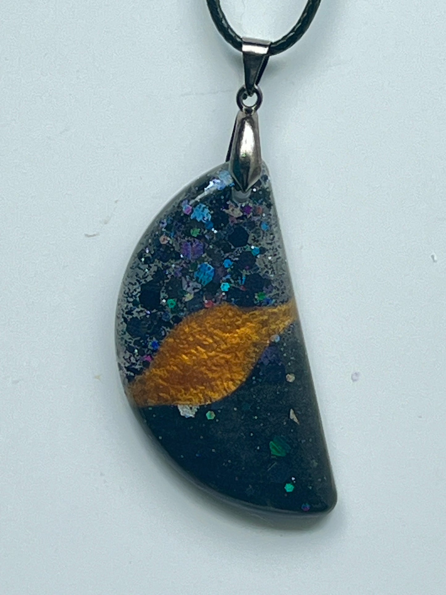 Ringed Planet — Black & Gold Cosmic Resin Pendant