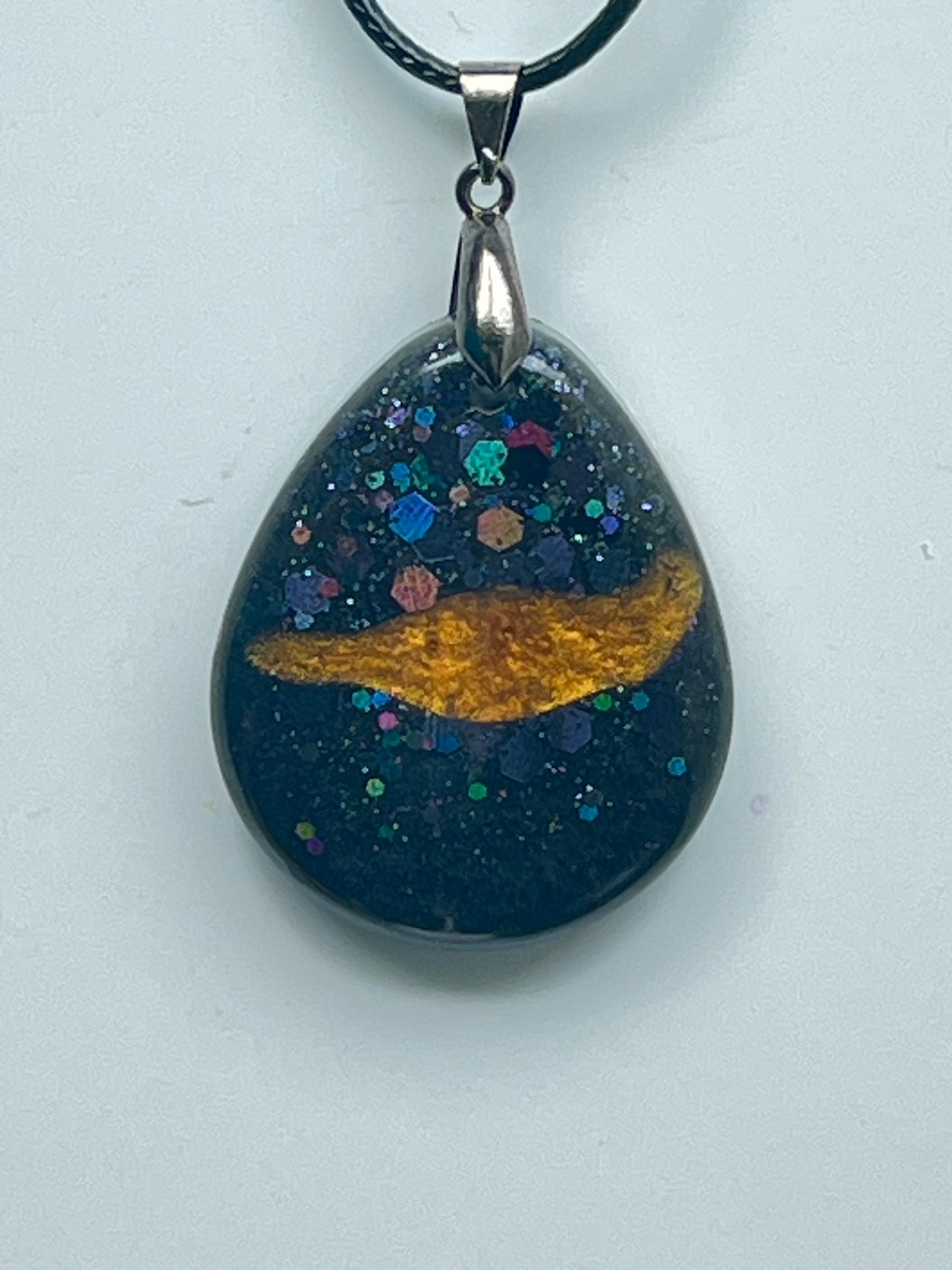 Nebula Comet — Black & Gold Galaxy Resin Pendant