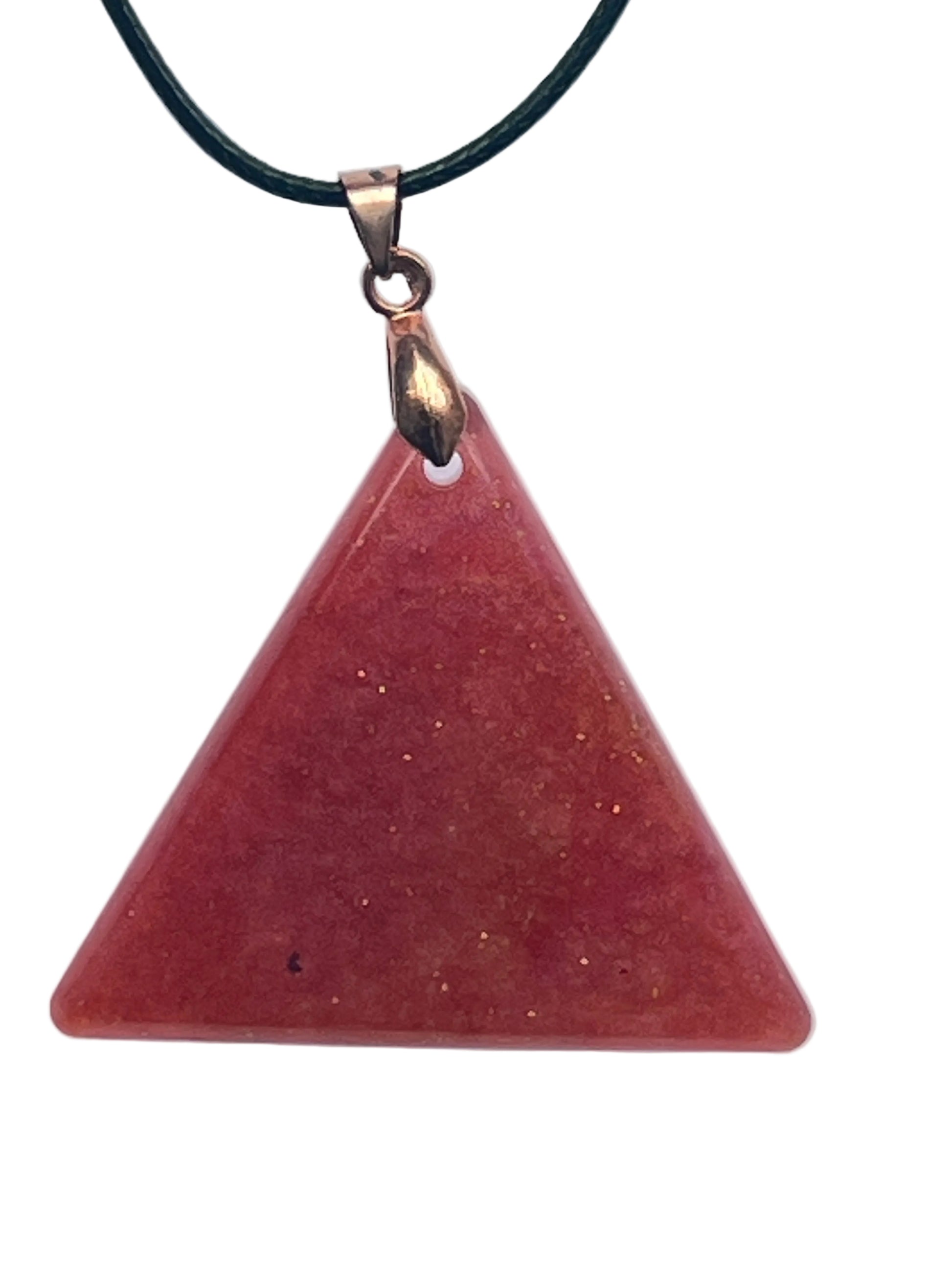 A triangular resin pendant in warm terracotta and rust red, scattered throughout with fine gold sparkle flecks. It hangs from a rose gold bail on a black braided cord against a pale background.
